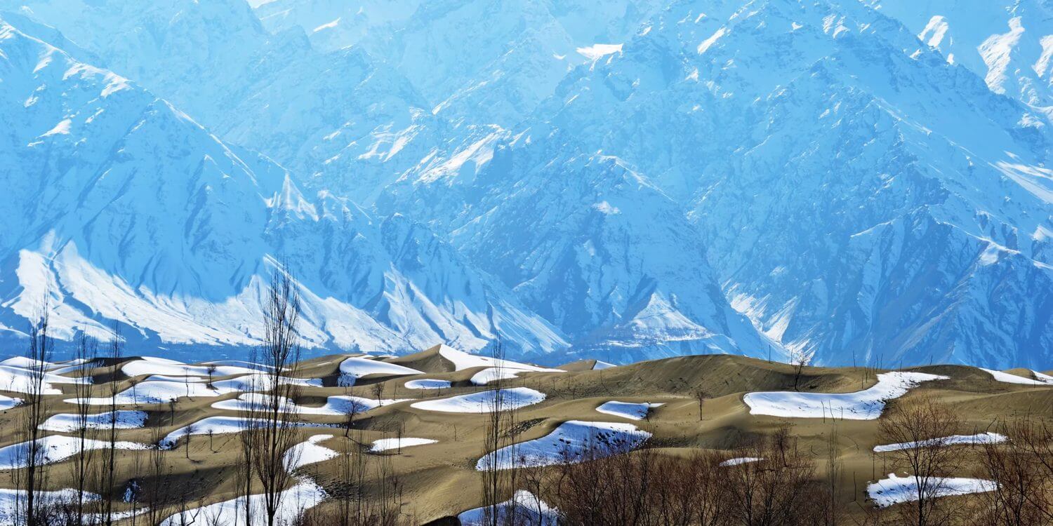 Snow lying on the cold desert dunes below the Karakoram, Skardu in winter