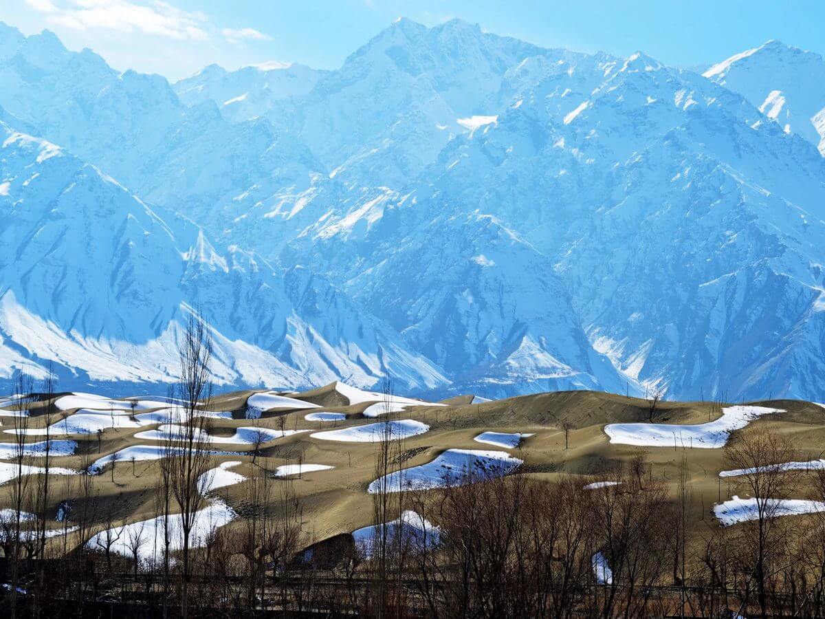Snow lying on the cold desert dunes below the Karakoram, Skardu in winter